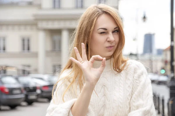 Cute cheerful caucasian woman walking on european street. She we — 스톡 사진