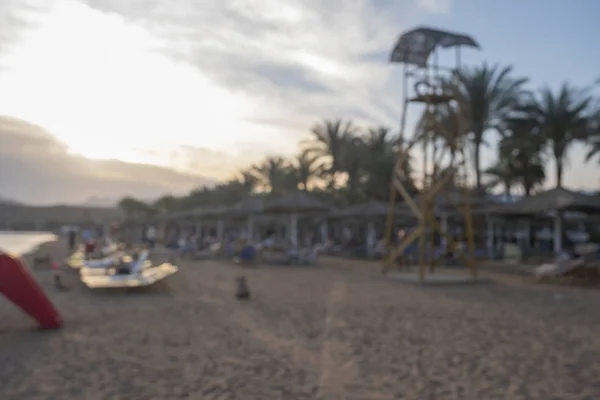 Blurred bokeh background texture of a beach, tropical seashore. — Stock Photo, Image