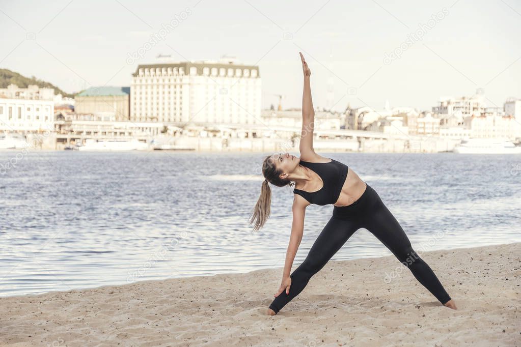 Slim fit caucasian brunette woman outdoor exercising in sport ou