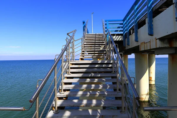 Iron stairs at the sea pier