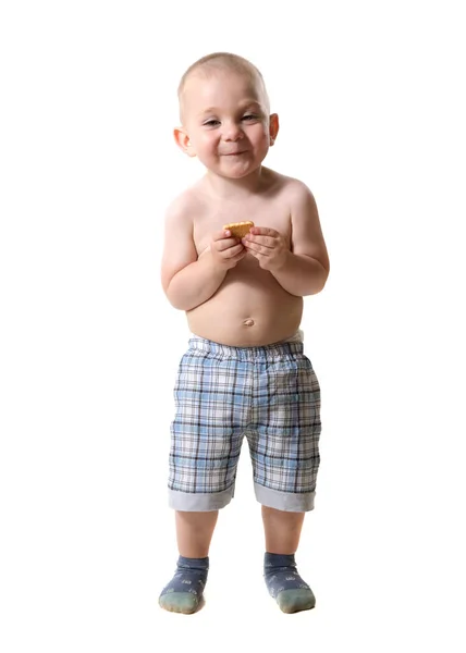 Retrato de un niño rubio de ojos azules en pleno crecimiento, sobre un fondo blanco . —  Fotos de Stock