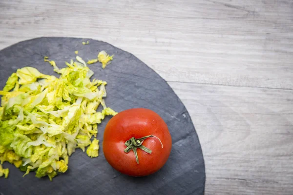 Red Tomato Chopped Lettuce Blackboard Grey Wooden Table — Stock Photo, Image