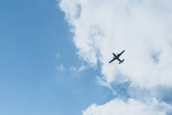 Airplane in the sky on a sunny day. Copy space.