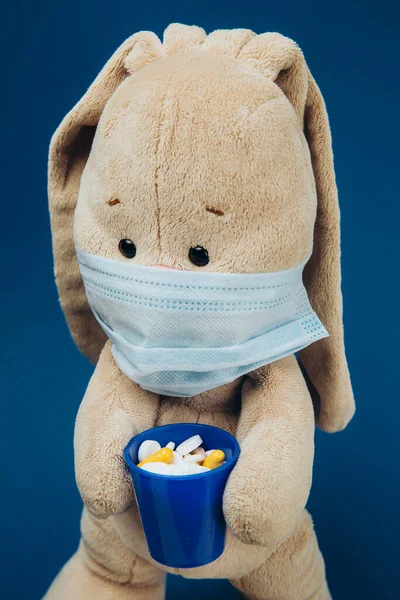 Toy Bunny Wears Protective Medical Mask Flapper Holds Glass Pills — Stock Photo, Image