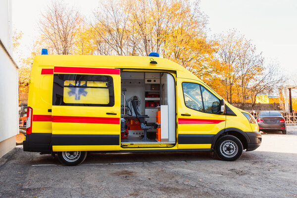 Zaporozhye/Ukraine- November 08 2019 :Ambulance with an open door. Side view.