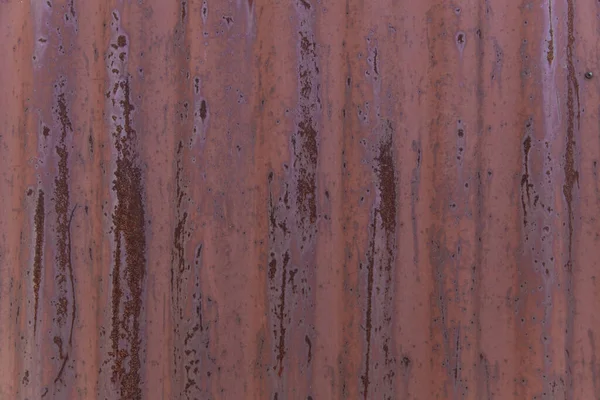 Rusty old corrugated iron sheet. Textile, abstract background.