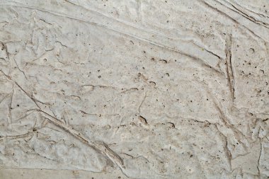 Düz olmayan macun katmanlı beton duvar dokusu. Desenli