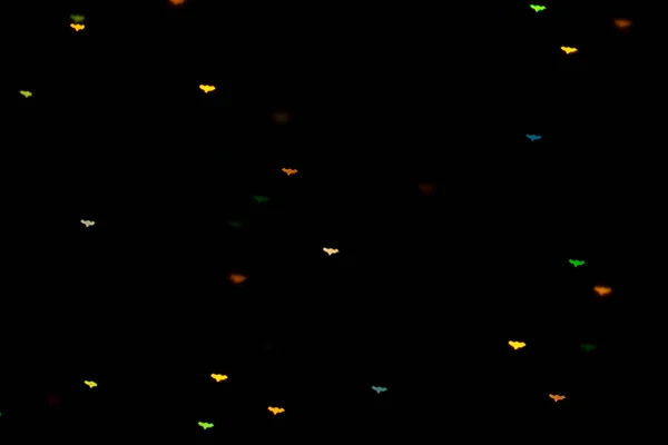 Halloween Background Defocused Bokeh Multicolor Lights Shape Bats Black Background — Stock Photo, Image