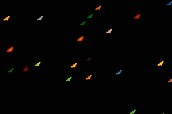 Defocused Bokeh Multicolor Lights Shape Bats Black Background Halloween Background — Stock Photo, Image