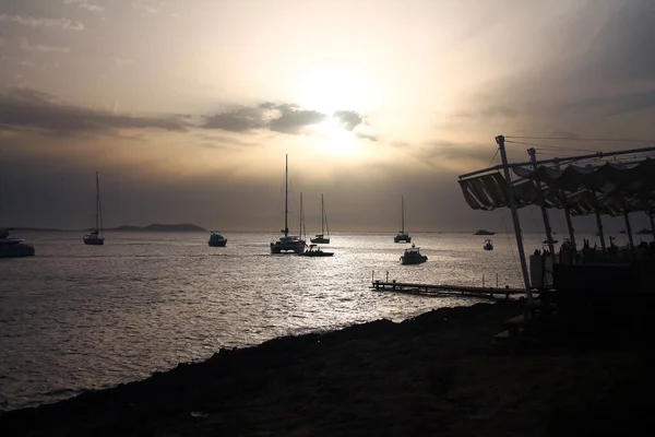 White sunset and boats in Ibiza — Stock Photo, Image