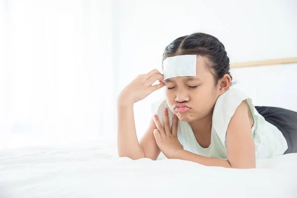 Young Asian Cool Gel Forehead Having Headache Lying Bed — Stock Photo, Image