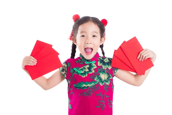 Little chinese girl in red color traditional dress stand,holding red packet money — Stock Photo, Image