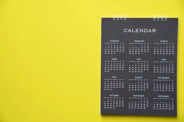 Närbild Kalender Gul Bakgrund Planering För Företag Möte Eller Reseplanering — Stockfoto
