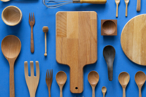 kitchen utensils for cooking on the blue background, food prepare concept