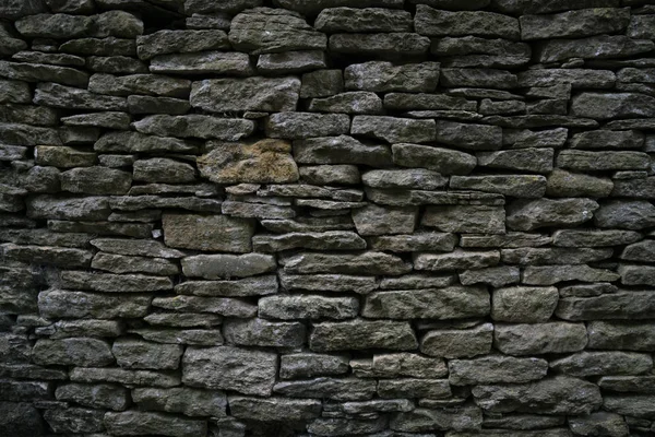 Textur und Hintergrund der Steinmauer, Nahaufnahme — Stockfoto