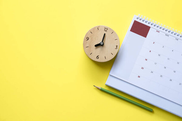 close up of calendar on the yellow table, planning for business 