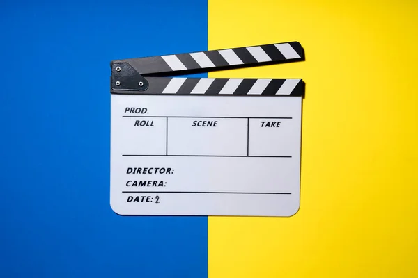 Movie Clapper Blue Yellow Table Background Film Cinema Video Photography — Stock Photo, Image