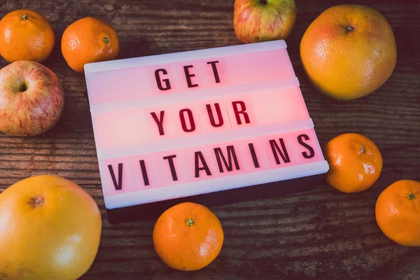 Get Your Vitamins Concept Lightbox Message Surrounded Healthy Oranges Grapefruits — Stock Photo, Image