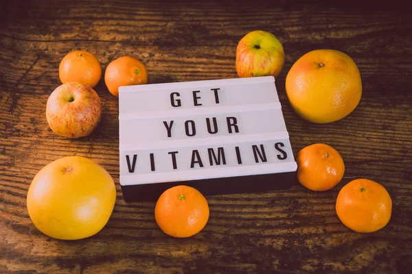 Get Your Vitamins Concept Lightbox Message Surrounded Healthy Oranges Grapefruits — Stock Photo, Image