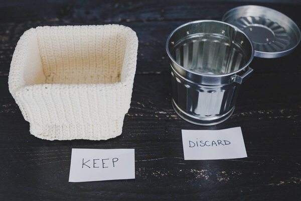 storage basket and gargabe bin to select which items to keep and