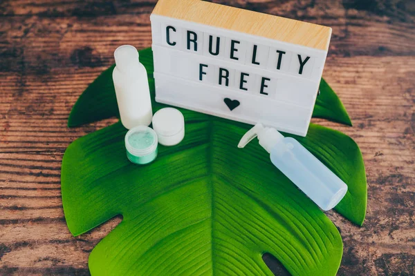 cruelty free message on lightbox with skincare products, vegan e