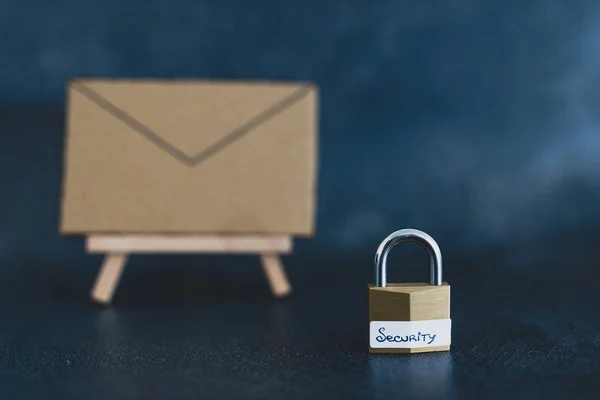 user privacy concept, email envelope miniature on easel with loc