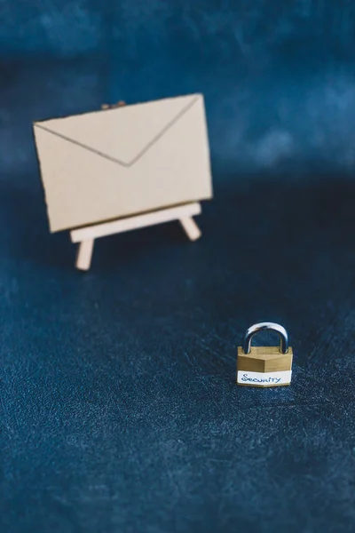 user privacy concept, email envelope miniature on easel with loc