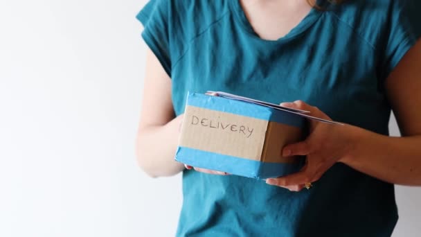 Woman Delivery Parcel Envelopes Her Hands Giving Them Recipient — Stock Video