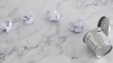 Yaratıcı blok ya da tükenme kavramı, bir grup buruşmuş kağıt top çöp kutusuna gidiyor ve bir tanesini bir not defteriyle değiştiriyor.