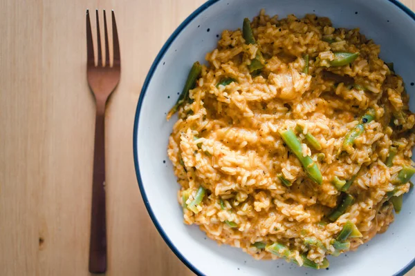 healthy plant-based food recipes concept, vegan red pesto risotto with green beans