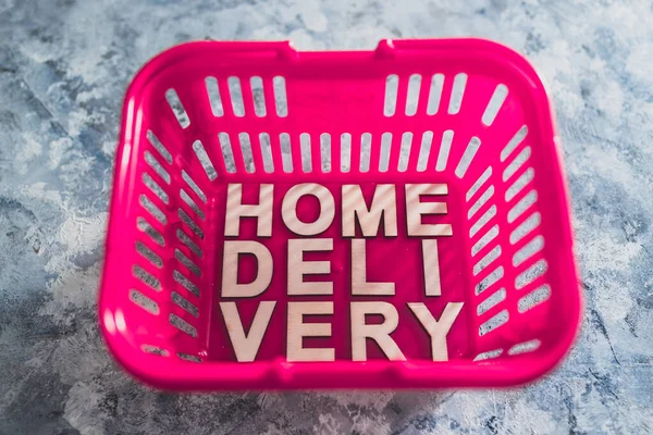online grocery shopping and no contact delivery, shopping basket with Home Delivery text in it