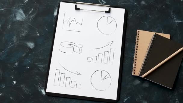 Statistikkonzept Schreibtisch Mit Gemischten Diagrammen Und Diagrammen Auf Klemmbrett Und — Stockvideo