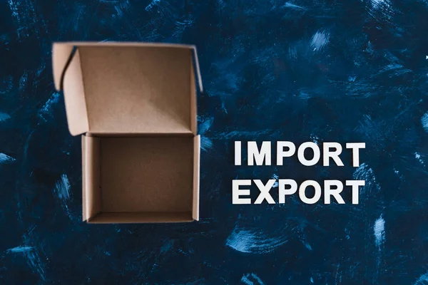 international trade and global business concept, Import Export text next to open parcel box