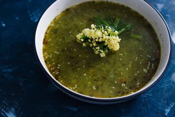 healthy plant-based food recipes concept, vegan cauliflower leaves leek and potato soup