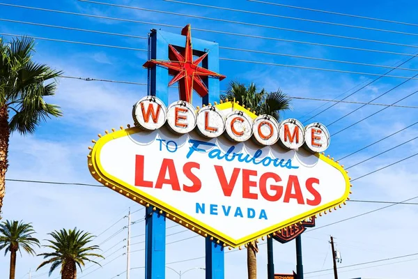 The Welcome to Fabulous Las Vegas sign on bright sunny day in Las Vegas.Welcome to Never Sleep city Las Vegas, Nevada Sign with the heart of Las Vegas scene in the background. — Stock Image Welcome Fabulous Las Vegas Sign Bright Sunny Day Las Vegas Royalty Free Stock Images