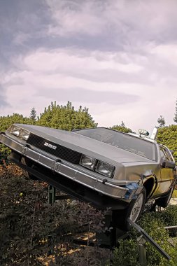 OSAKA, JAPAN - Feb 12, 2016 : Use movie of Ready Player One. Photo of De Lorean from Back to the Future at Universal Studios Japan.  clipart