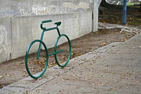 A bike parking opportunity with a symbol.bike parking Bicycle racks in bicycle parking facility Modern bike storage in the form of a steel spiral Bicycle parking.