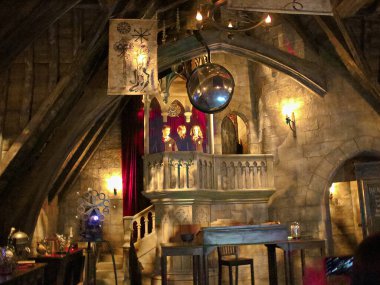Osaka, Japan - Nov 5, 2016 : Inside the Harry Potter Park Castle 'Hogwarts Castle Tour' at the Wizarding World of Harry Potter in Universal Studios Japan. clipart