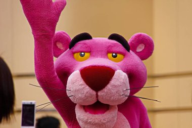 Osaka,JAPAN - 14 Apr, 2017:Pink panther during character greeting in Universal Studios Japan. clipart