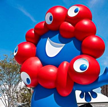 OSAKA,JAPAN - AUG 22 2025 : Editorial photograph of MYAKU MYAKU, the official mascot character of the 2025 Osaka Kansai Expo.Located in front of the West Gate of the Expo, it welcomes visitors.