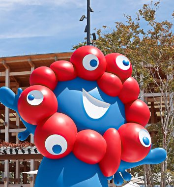 OSAKA,JAPAN - AUG 22 2025 : Editorial photograph of MYAKU MYAKU, the official mascot character of the 2025 Osaka Kansai Expo.Located in front of the West Gate of the Expo, it welcomes visitors.