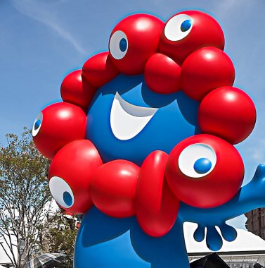 OSAKA,JAPAN - AUG 22 2025 : Editorial photograph of MYAKU MYAKU, the official mascot character of the 2025 Osaka Kansai Expo.Located in front of the West Gate of the Expo, it welcomes visitors.