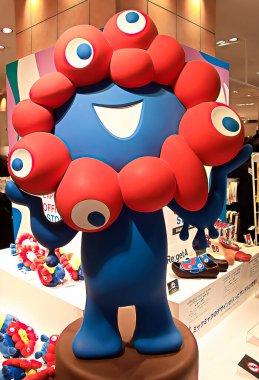 OSAKA,JAPAN - AUG 22 2025 : Editorial photograph of MYAKU MYAKU, the official mascot character of the 2025 Osaka Kansai Expo.Located in front of the West Gate of the Expo, it welcomes visitors.