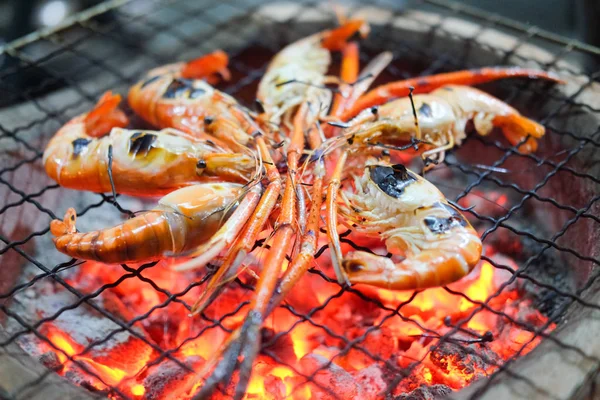 Grilled shrimp or easy BBQ grilled shrimp on grill. Diet or cooking concept