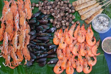 Muz yaprak (yengeç, karides, istiridye, midye, istiridye üzerinde sigorta primi Tay deniz ürünleri)