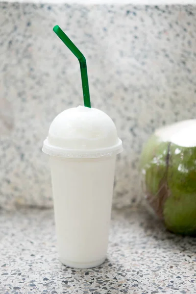 Tropical smoothies with coconut and milk. Refreshing summer