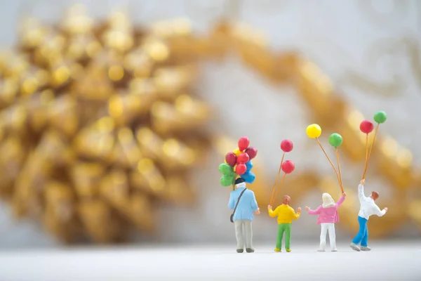 Miniature Group Happy Family Holding Balloons Standing Looking Fireworks Party — Stock Photo, Image