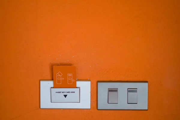 Power Switch Key Card Orange Cement Wall Warm Tone Orange — Stock Photo, Image