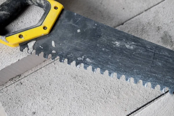 Close up manual saws from construction, metal saw