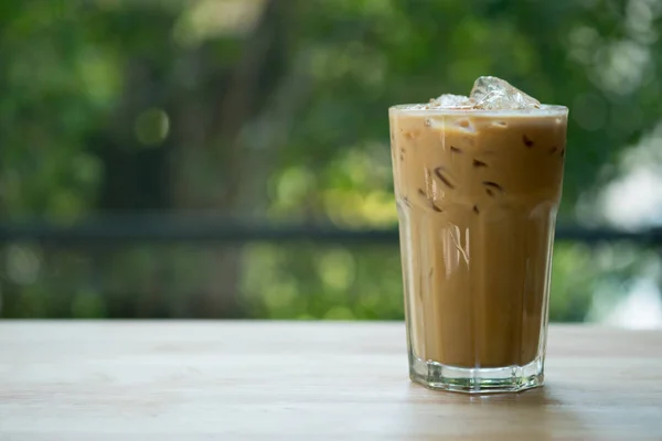 Iced espresso coffee in tall shape glass — Stock Photo, Image